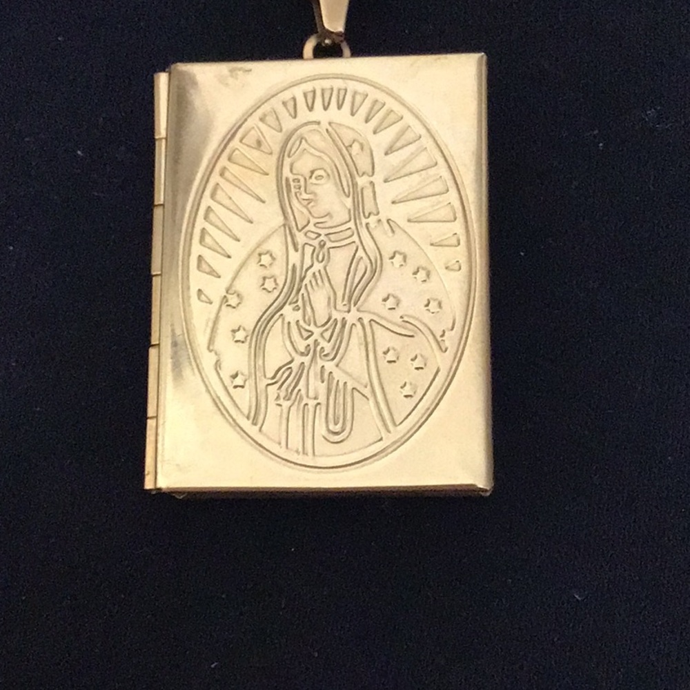 New gold colorized process stainless steel chain with holy mother Mary locket.